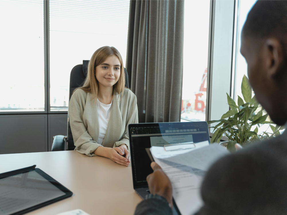 A Canadian woman being told she is getting a promotion at work, and she's hoping that earning more will help her save more. 